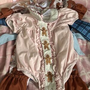 Pink Gingham Baby Romper with Gingerbread Design